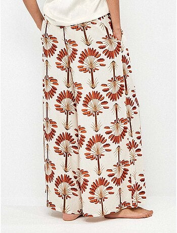 Lange broek met wijde pijpen en palmboomprint