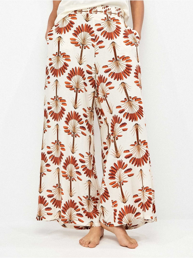 Lange broek met wijde pijpen en palmboomprint Multicolor - Kiabi