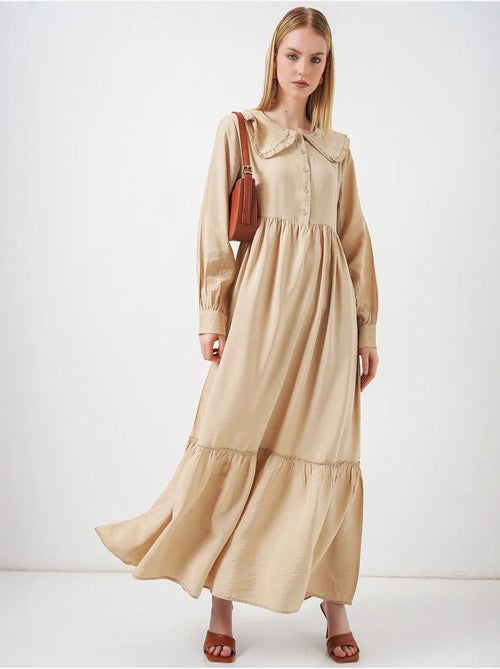 Lange jurk met babykraag en knoopsluiting bdart - Kiabi Lange jurk met babykraag en knoopsluiting bdart - Kiabi