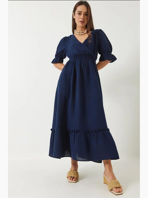Lange jurk met wikkelhals en elastische taille en mouwen lucci - Kiabi Lange jurk met wikkelhals en elastische taille en mouwen lucci - Kiabi