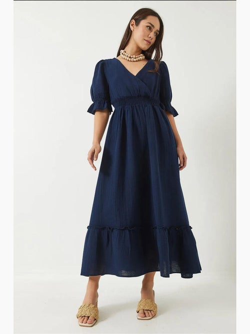 Lange jurk met wikkelhals en elastische taille en mouwen lucci - Kiabi Lange jurk met wikkelhals en elastische taille en mouwen lucci - Kiabi