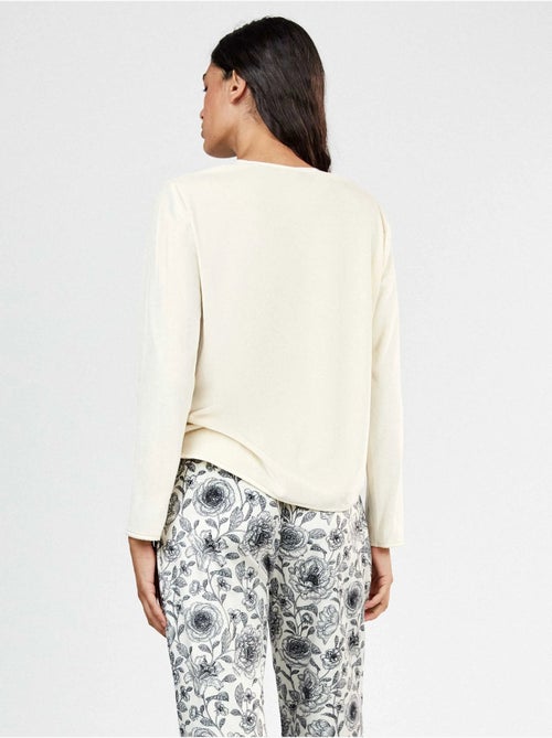 Lange pyjama met contrasterende bedrukte broek. - Kiabi Lange pyjama met contrasterende bedrukte broek. - Kiabi
