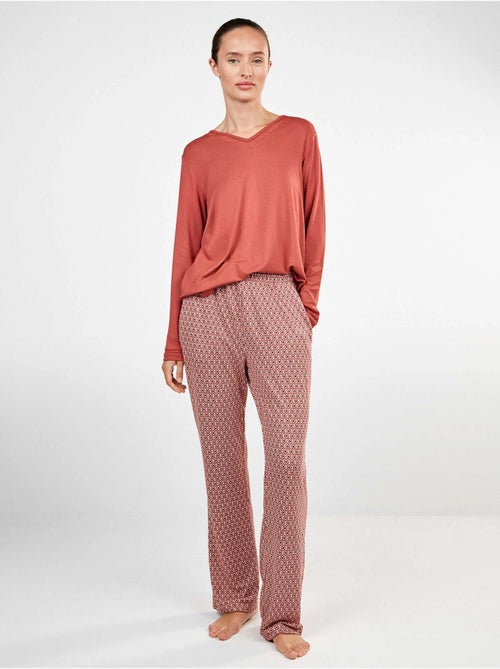Lange pyjama met v-hals met tule en microgeometrische broek - Kiabi Lange pyjama met v-hals met tule en microgeometrische broek - Kiabi