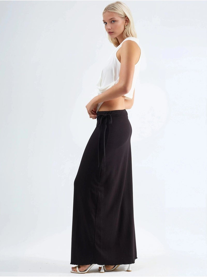Lange rok met hoge taille en knoopdetail busem Zwart - Kiabi