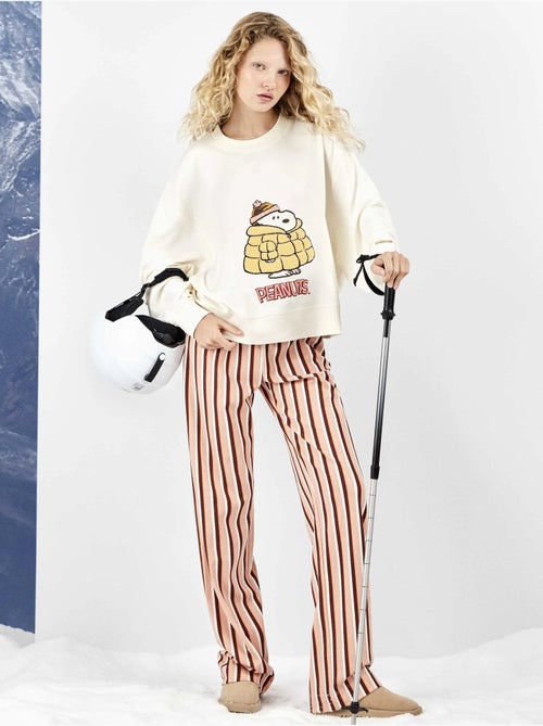 Lange snoopy pyjama met gestreepte broek - Kiabi Lange snoopy pyjama met gestreepte broek - Kiabi