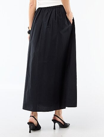 Lange, wijd uitlopende rok