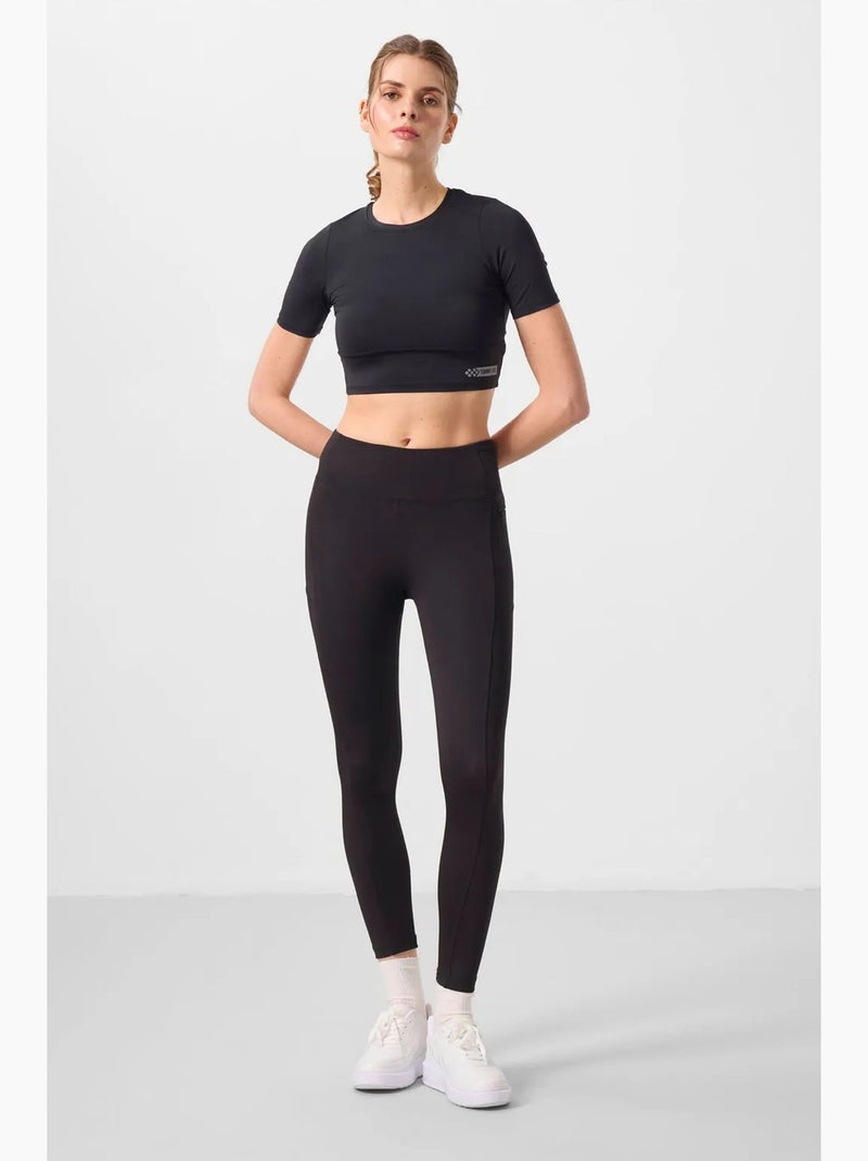 Legging met hoge taille en zak tommy Zwart - Kiabi