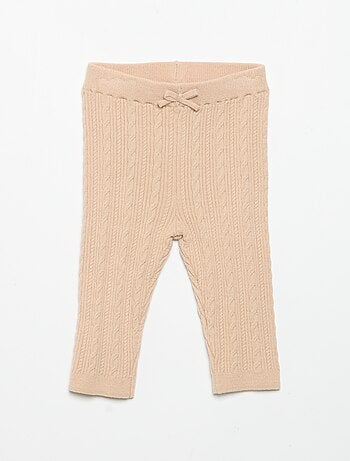 Legging met strikje en kabelpatroon