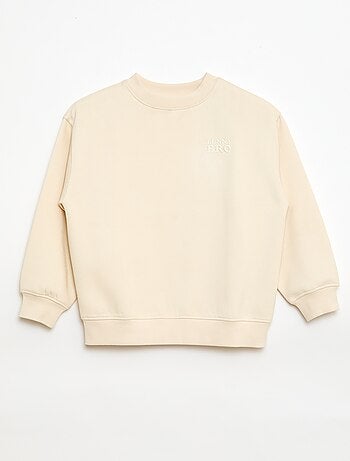 Loose sweater met "brother"-motief