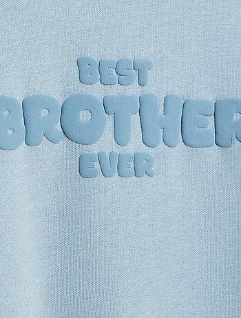 Loose sweater met "brother"-motief
