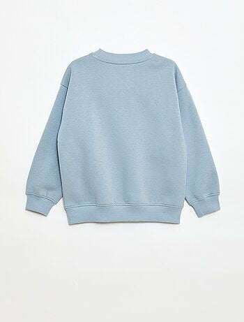 Loose sweater met "brother"-motief