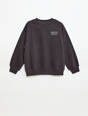 Loose sweater met "brother"-motief