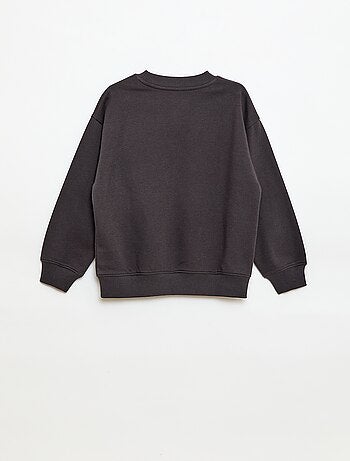 Loose sweater met "brother"-motief