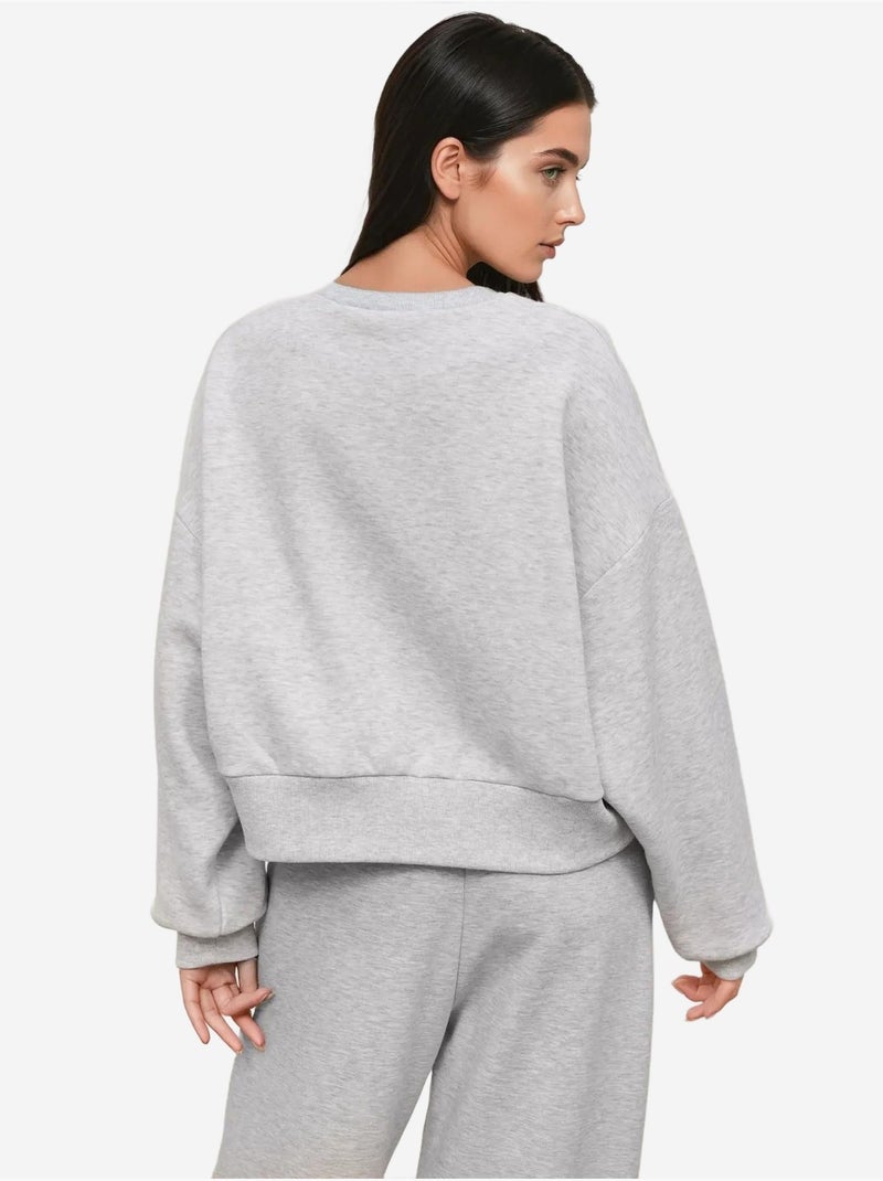 Losvallende gebreide sweatshirt met ronde hals en reliëf hiccup Grijs - Kiabi