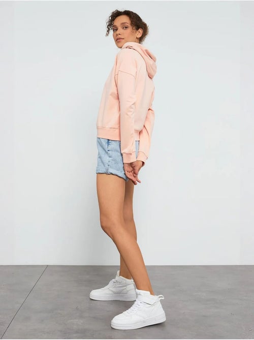 Losvallende hoodie met strikdetail tommy - Kiabi Losvallende hoodie met strikdetail tommy - Kiabi