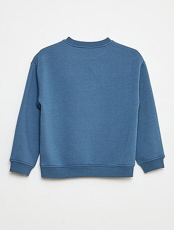 Losvallende sweater met print