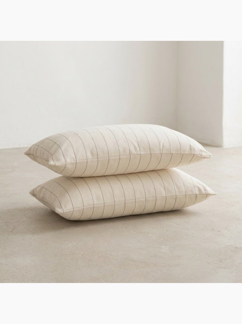 Lot de deux housses de coussin en coton à fils en relief, tissu texturé. Ecru - Kiabi