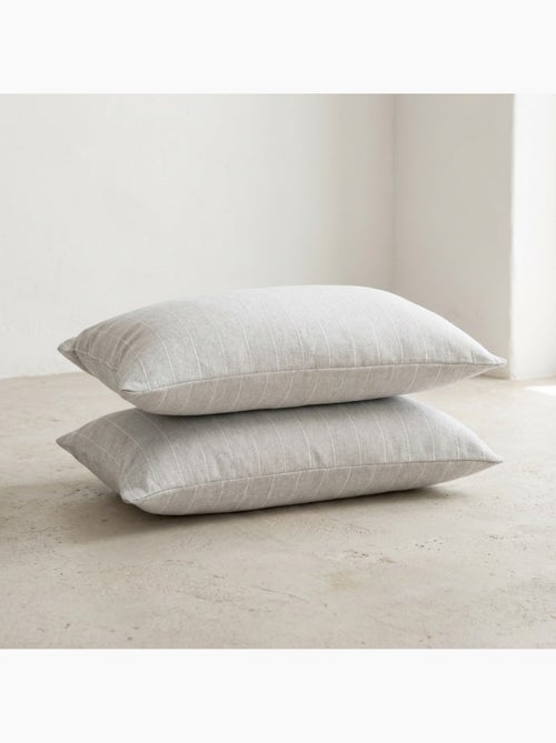 Lot de deux housses de coussin en coton à fils en relief, tissu texturé. - Kiabi