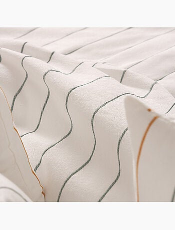 Lot de deux housses de coussin en coton à fils en relief, tissu texturé.