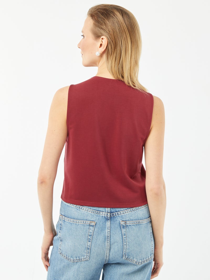 Luchtig, mouwloos jasje met knoopsluiting ROOD - Kiabi