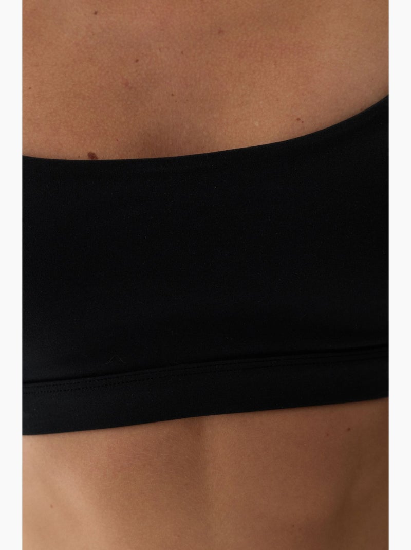 Lycra sport-bh met lichte ondersteuning, uitneembare pads en racerback penti Zwart - Kiabi