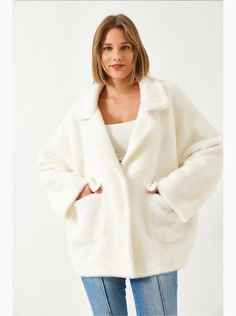 Manteau surdimensionné en fausse fourrure à double poche lucci Ivoire - Kiabi