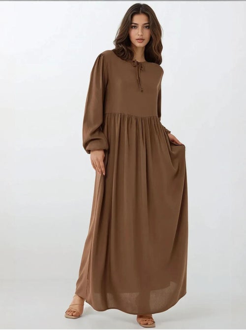 Maxi-jurk met a-vorm en ronde hals hiccup - Kiabi Maxi-jurk met a-vorm en ronde hals hiccup - Kiabi