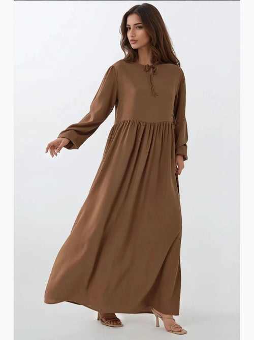 Maxi-jurk met a-vorm en ronde hals hiccup - Kiabi Maxi-jurk met a-vorm en ronde hals hiccup - Kiabi