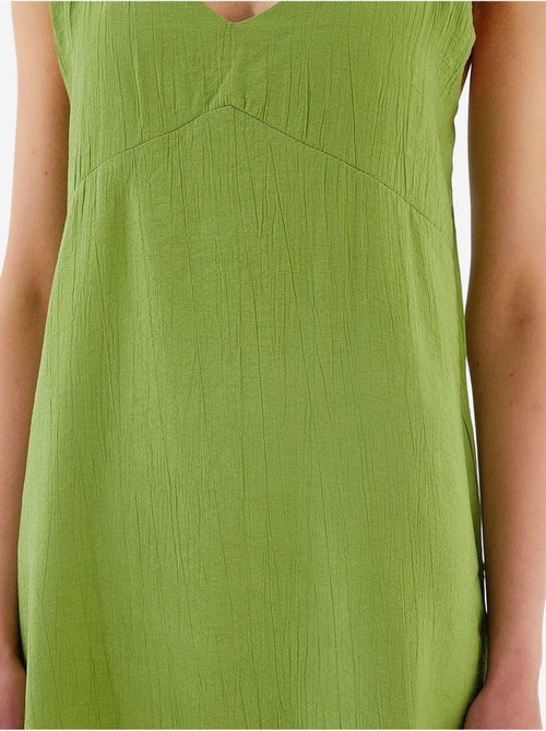 Midi-jurk met v-hals en split mixray - Kiabi Midi-jurk met v-hals en split mixray - Kiabi