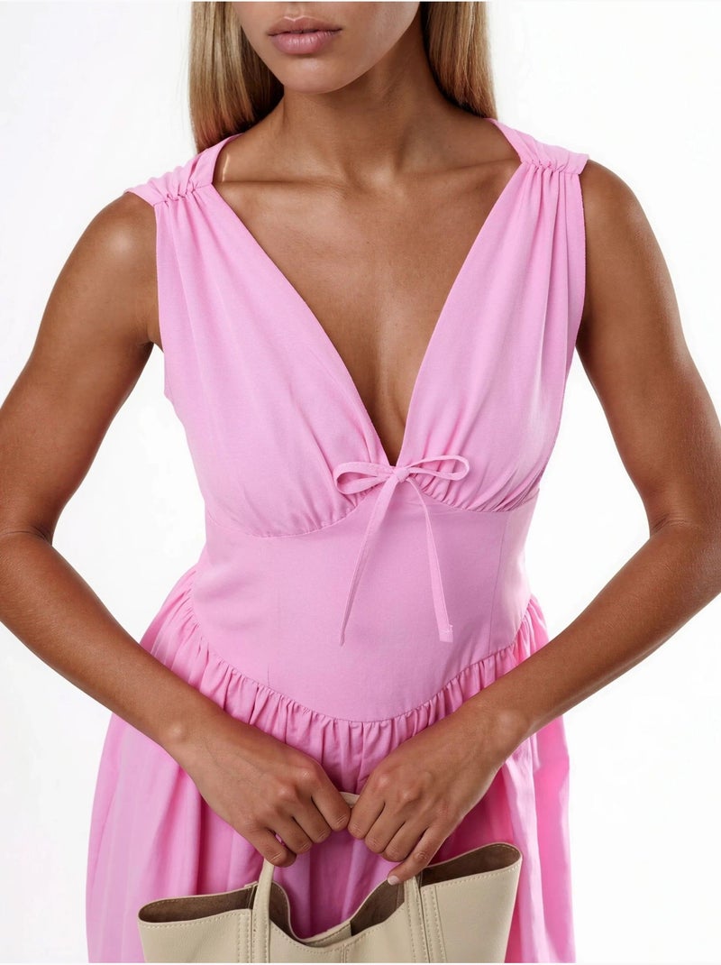 Midi-jurk met v-hals en strikdetail busem Bleekroze - Kiabi