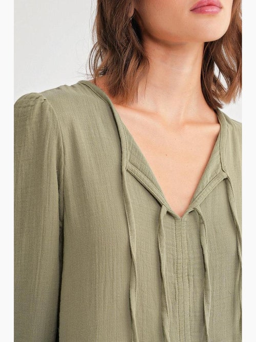 Midi-jurk met v-hals en striksluiting mixray - Kiabi Midi-jurk met v-hals en striksluiting mixray - Kiabi