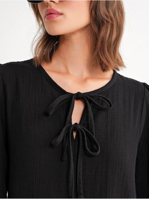Midi-jurk met v-hals en striksluiting mixray - Kiabi Midi-jurk met v-hals en striksluiting mixray - Kiabi