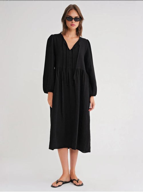 Midi-jurk met v-hals en striksluiting mixray - Kiabi Midi-jurk met v-hals en striksluiting mixray - Kiabi
