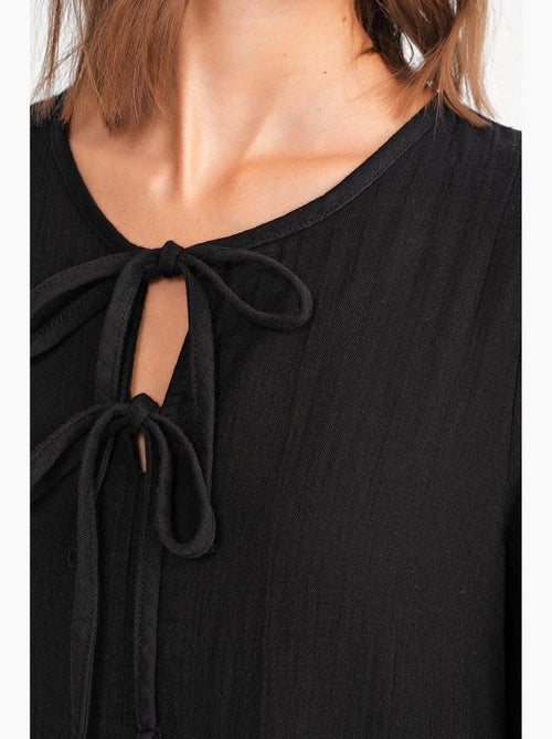 Midi-jurk met v-hals en striksluiting mixray - Kiabi Midi-jurk met v-hals en striksluiting mixray - Kiabi