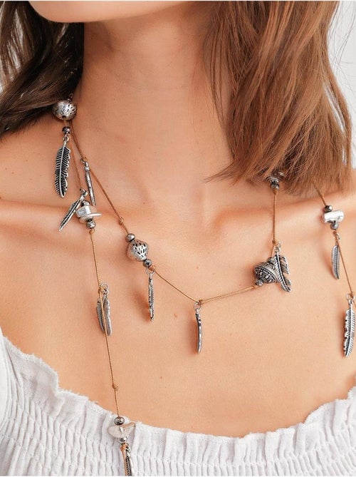 Midi mousseline jurk met ruchesdetail mixray - Kiabi Midi mousseline jurk met ruchesdetail mixray - Kiabi