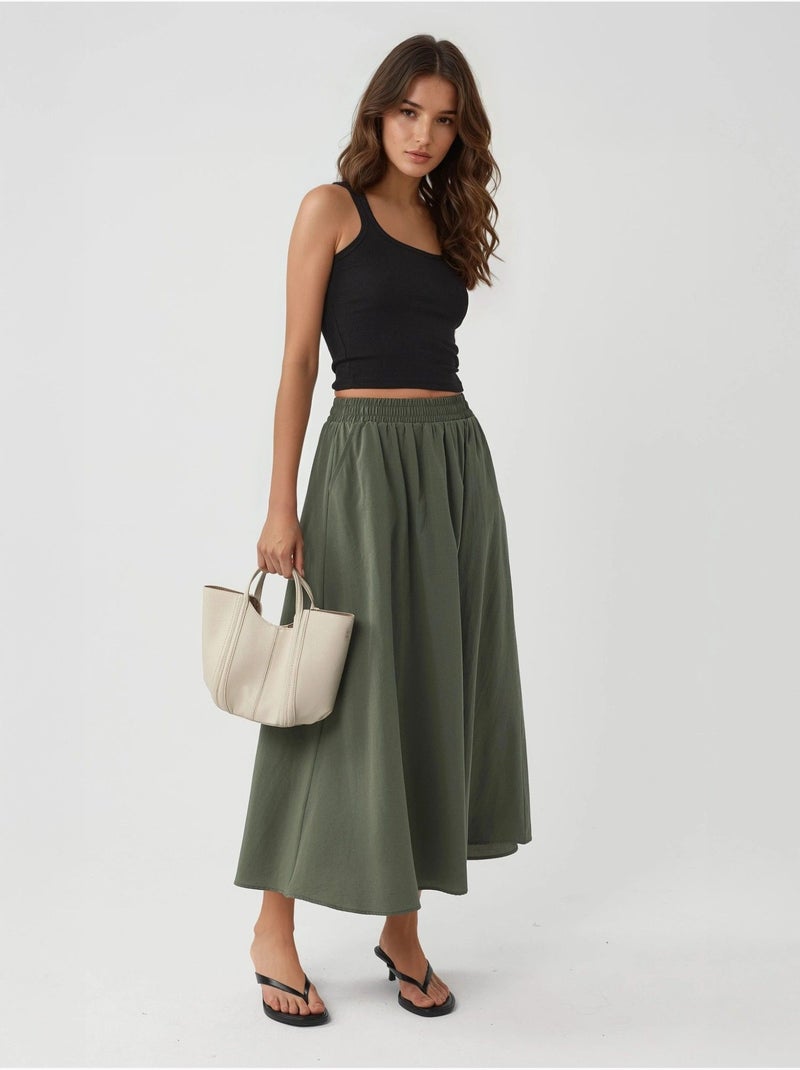 Midi-rok met elastische taille en zakken busem Kakigroen - Kiabi