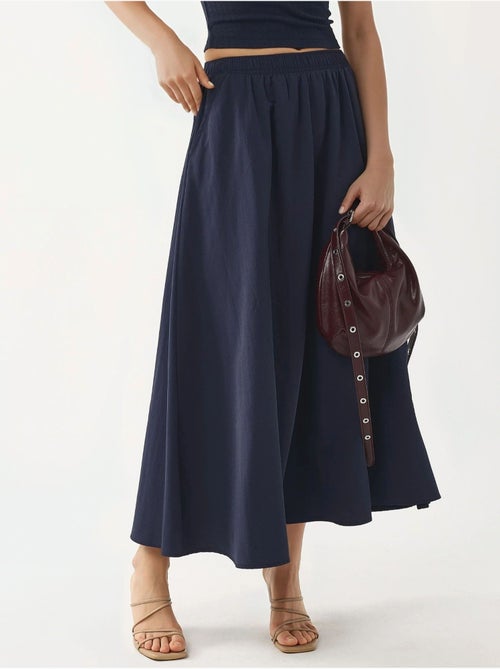Midi-rok met elastische taille en zakken busem - Kiabi Midi-rok met elastische taille en zakken busem - Kiabi