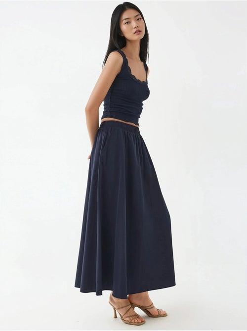 Midi-rok met elastische taille en zakken busem - Kiabi Midi-rok met elastische taille en zakken busem - Kiabi