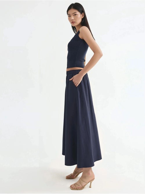 Midi-rok met elastische taille en zakken busem - Kiabi Midi-rok met elastische taille en zakken busem - Kiabi