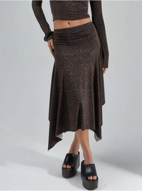 Midi-rok met hoge taille, luipaardprint en asymmetrische snit busem - Kiabi Midi-rok met hoge taille, luipaardprint en asymmetrische snit busem - Kiabi
