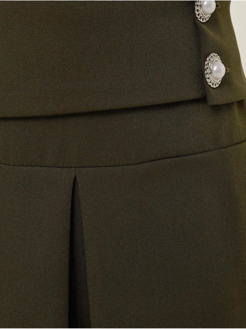 Mini-jupe plissée avec détails en perles Vert - Kiabi