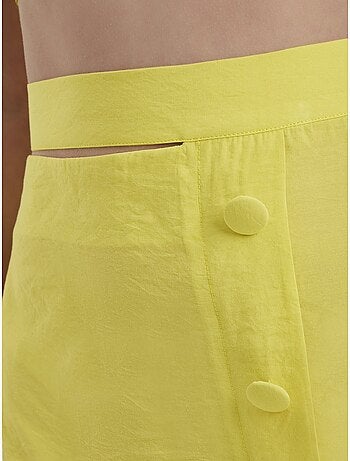 Mini-jupe taille haute avec boutons latéraux hiccup