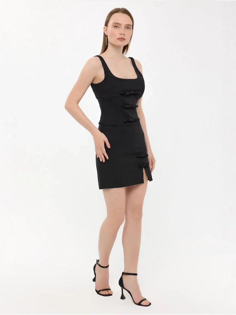 Mini-jupe tissée taille haute avec détail nœud Noir - Kiabi