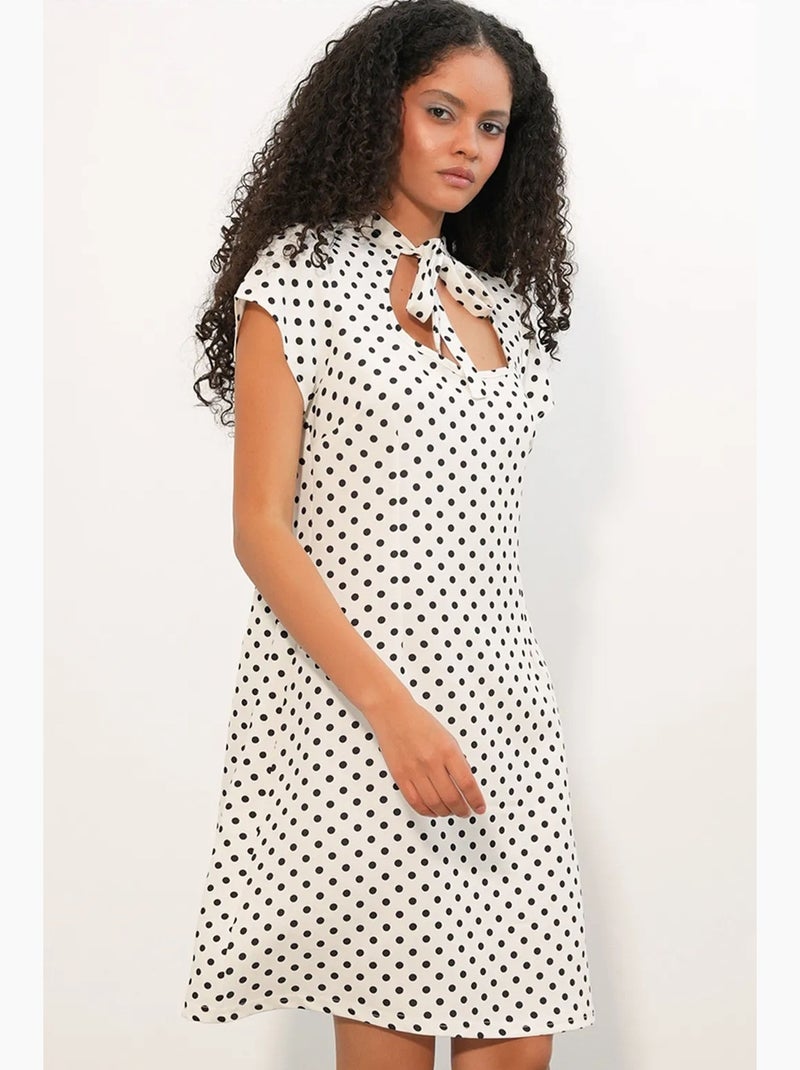 Mini-jurk in a-lijn met polkadots en strik bdart Gebroken wit - Kiabi