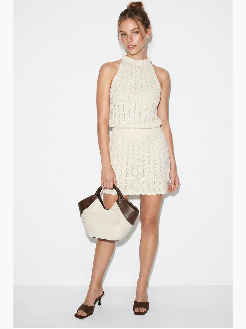 Mini-jurk van breisel met kabelpatroon en halter lucci Crème - Kiabi