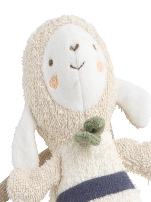 Mini-knuffel met muziek, gemaakt van biologisch katoen met bouclé-structuur - Kiabi Mini-knuffel met muziek, gemaakt van biologisch katoen met bouclé-structuur - Kiabi