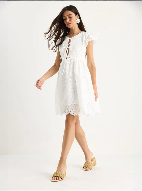 Mini-robe avec nœud et doublure à œillets lucci - Kiabi Mini-robe avec nœud et doublure à œillets lucci - Kiabi