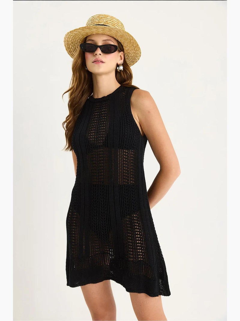 Mini-robe en tricot texturé à col licou avec détails en dentelle lucci Noir - Kiabi