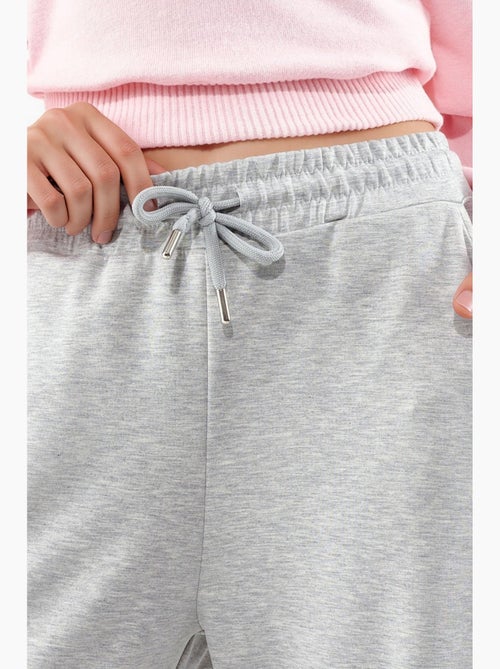 Modal broek met middelhoge taille en wijde pijpen busem - Kiabi Modal broek met middelhoge taille en wijde pijpen busem - Kiabi