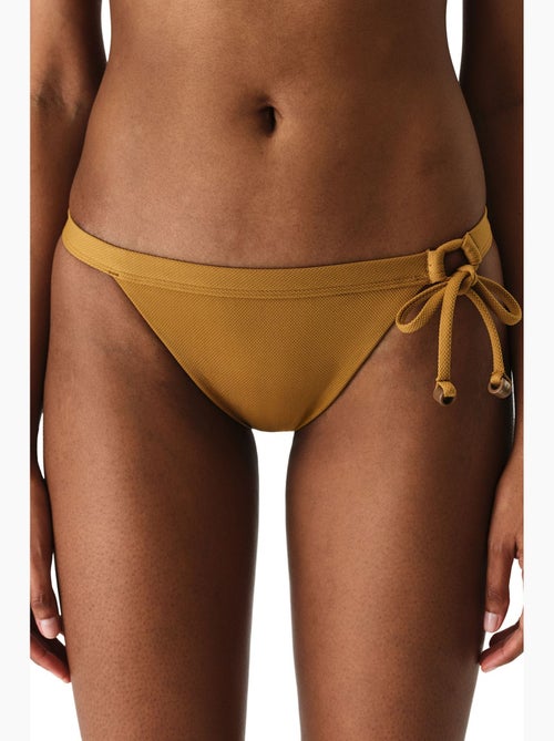 Montana bikinibroekje met structuur aan de zijkant en middelhoge taille penti - Kiabi Montana bikinibroekje met structuur aan de zijkant en middelhoge taille penti - Kiabi